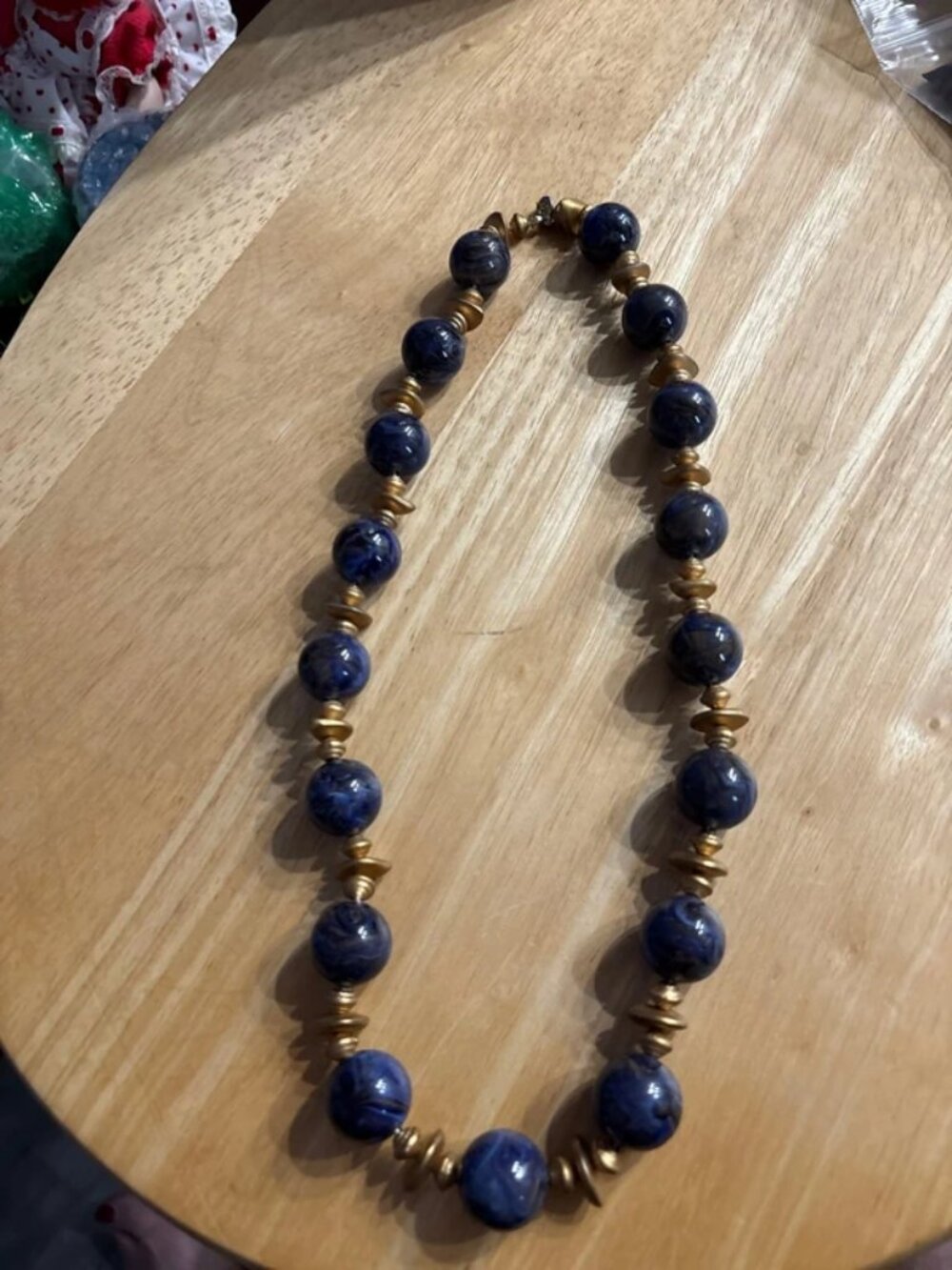 Blue beaded necklace w/gold spacers 22inches